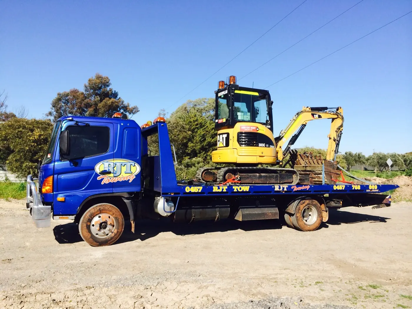 Excavator moved by RJT